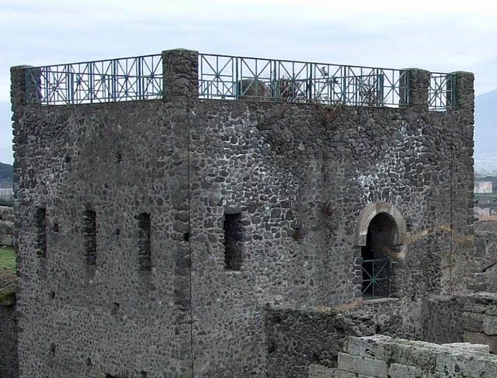 Tower XI, Pompeii. December 2007. North and west side of tower, with doorway from middle room on west side onto wall-walk. 