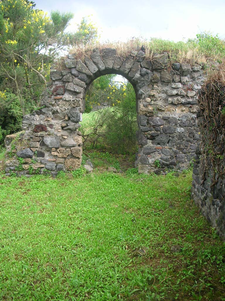 Tower XII, Pompeii. May 2010. 
Looking east from interior through doorway along city walls. Photo courtesy of Ivo van der Graaff.
