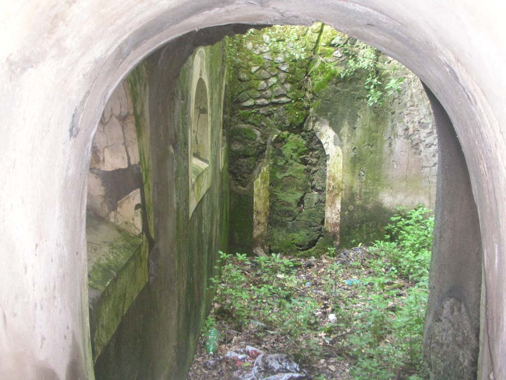 Tower VIII, Pompeii. May 2010. 
Looking east towards interior of main chamber with blocked-up postern doorway, and newly finished windows, on left. 
Photo courtesy of Ivo van der Graaff.
