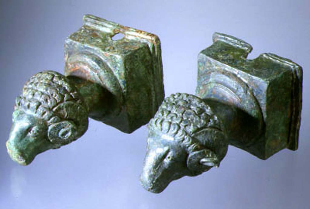 Villa della Pisanella, Boscoreale. Bronze cart shaft ends decorated with rams heads.
Photograph © Parco Archeologico di Pompei.

