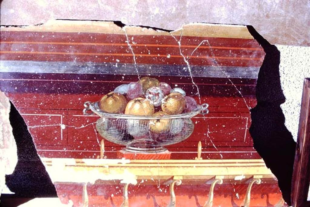 Oplontis, 1968.  Room 23, painted wall with still-life of glass bowl with pomegranates. Photo by Stanley A. Jashemski. 
Source: The Wilhelmina and Stanley A. Jashemski archive in the University of Maryland Library, Special Collections (See collection page) and made available under the Creative Commons Attribution-Non Commercial License v.4. See Licence and use details. J68f1468
