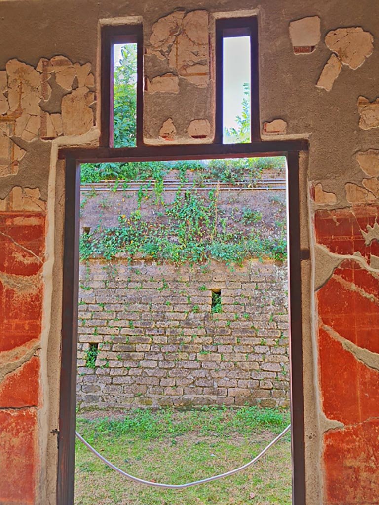 Oplontis Villa of Poppea, October 2023.
Room 24, looking towards the decorated south wall, through doorway into unexcavated from the portico.
Photo courtesy of Giuseppe Ciaramella.
