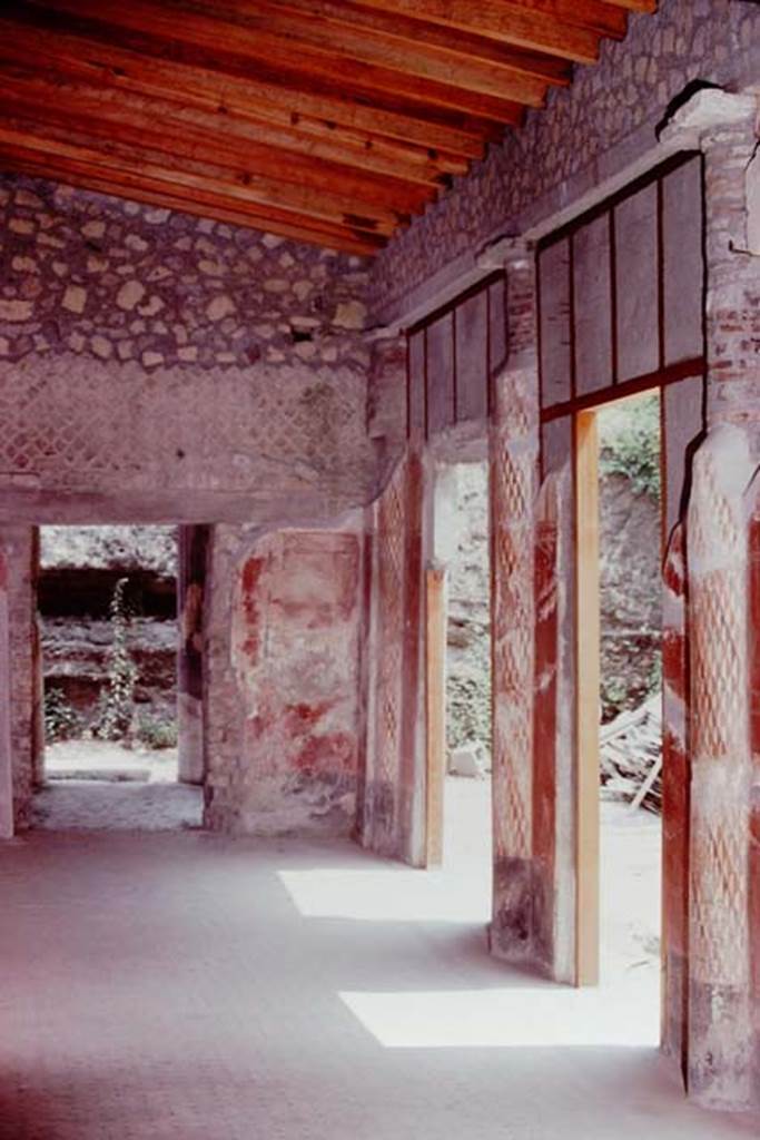 Oplontis, 1974. Room 24, looking east towards portico 40, and unexcavated peristyle 59. Photo by Stanley A. Jashemski.   
Source: The Wilhelmina and Stanley A. Jashemski archive in the University of Maryland Library, Special Collections (See collection page) and made available under the Creative Commons Attribution-Non Commercial License v.4. See Licence and use details. J74f0629
