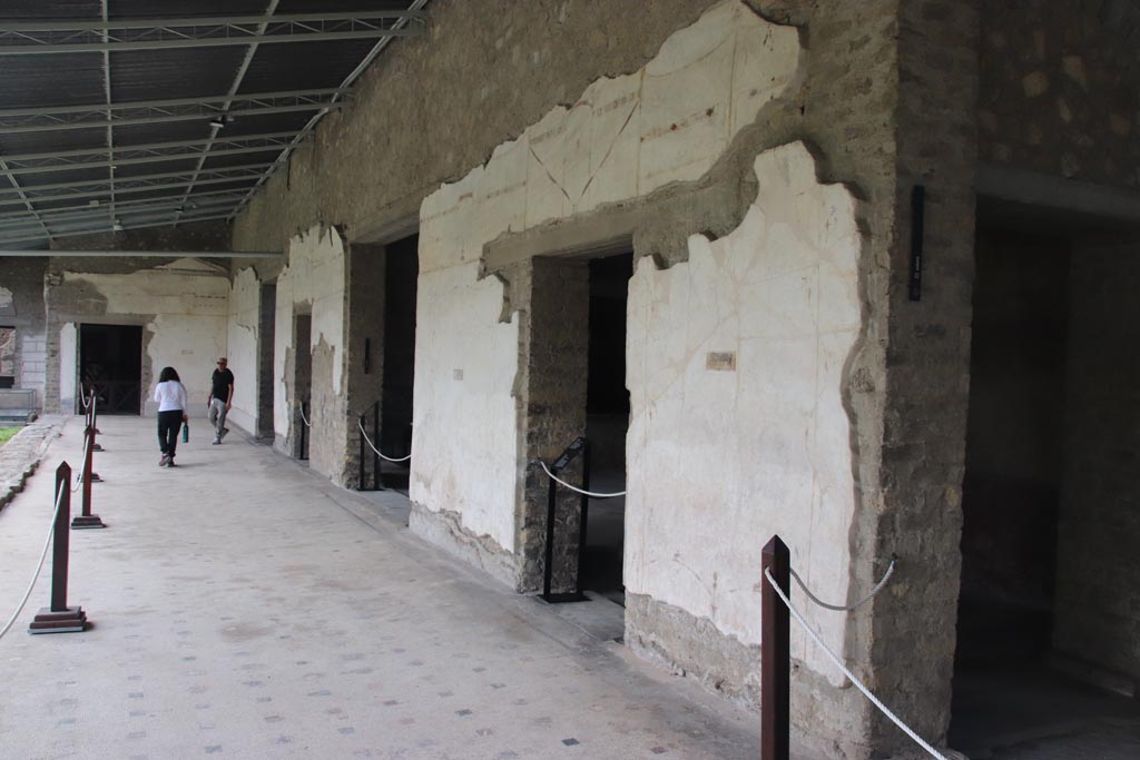 Villa of Poppaea, Oplontis, October 2023. 
Area 60, looking south along west portico, with doorway to room 75, on right. Photo courtesy of Klaus Heese. 
