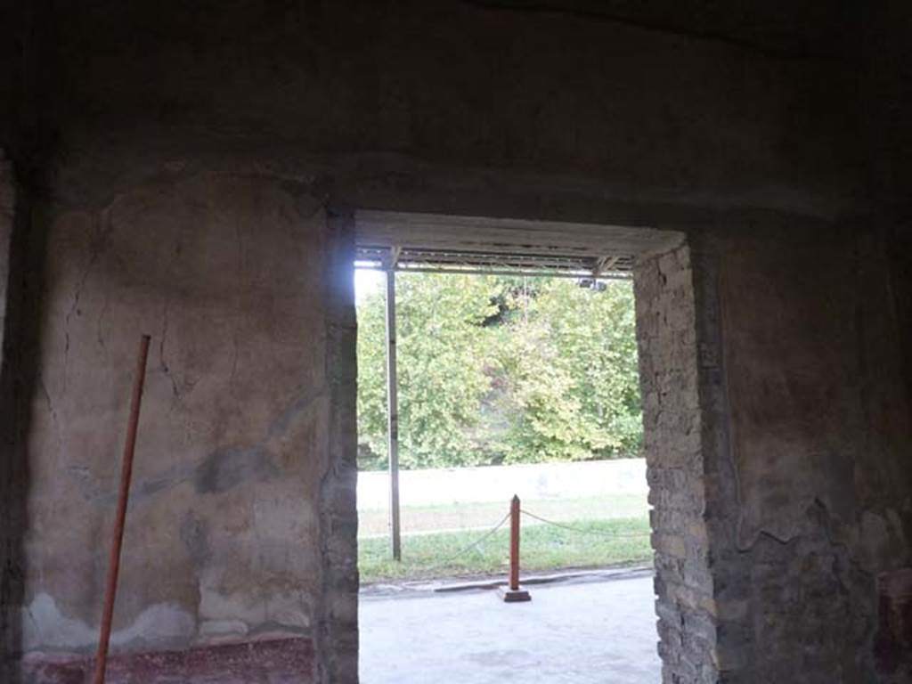 Oplontis, September 2015. Room 75, east wall with doorway to Portico 60.