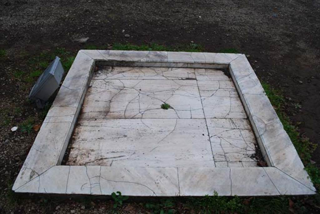 Oplontis Villa of Poppea, February 2009. Room 92, looking north over the small impluvium like marble feature.
Photo courtesy of Drew Baker - from the King's College London, Villa of Oplontis Archive.
