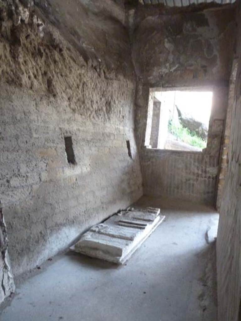 Oplontis, September 2015. Room 97, looking east towards window and doorway onto Portico 60.