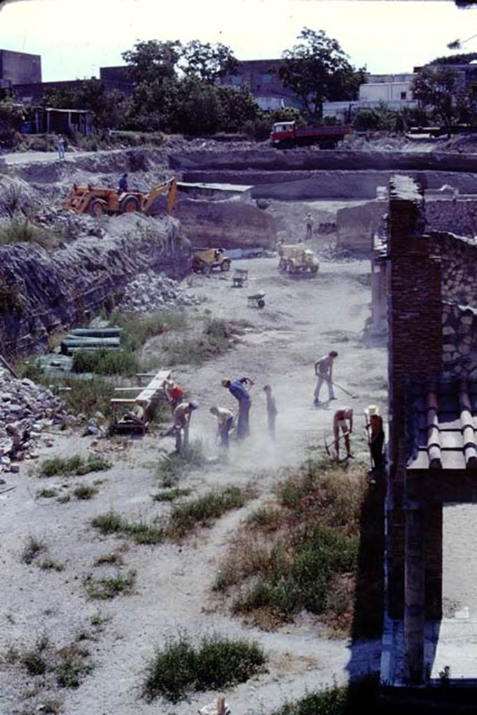 Oplontis Villa of Poppea, 1975. Looking east across the north garden, towards the gap in the wall of room 69, from near the north side of room 33, the west portico. Photo by Stanley A. Jashemski.   
Source: The Wilhelmina and Stanley A. Jashemski archive in the University of Maryland Library, Special Collections (See collection page) and made available under the Creative Commons Attribution-Non Commercial License v.4. See Licence and use details. J75f0030
