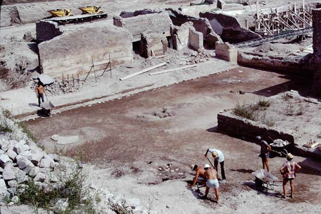 Oplontis, 1975. Looking south-east across east end of north garden, towards doorway of room 69, on left, and two doorways into room 64. Photo by Stanley A. Jashemski.   
Source: The Wilhelmina and Stanley A. Jashemski archive in the University of Maryland Library, Special Collections (See collection page) and made available under the Creative Commons Attribution-Non Commercial License v.4. See Licence and use details. J75f0170
