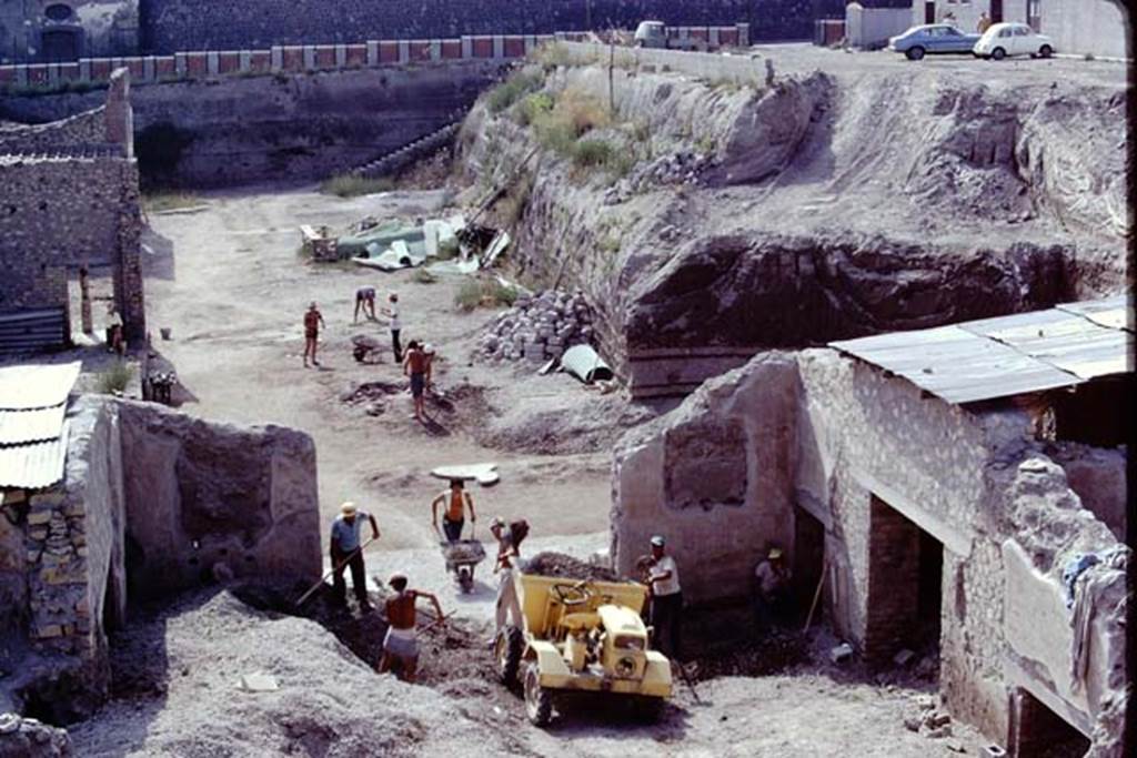 Oplontis, 1975. Looking west across room 69, with doorways to rooms 71/70/72, on the right.  Photo by Stanley A. Jashemski.   
Source: The Wilhelmina and Stanley A. Jashemski archive in the University of Maryland Library, Special Collections (See collection page) and made available under the Creative Commons Attribution-Non Commercial License v.4. See Licence and use details. J75f0173
