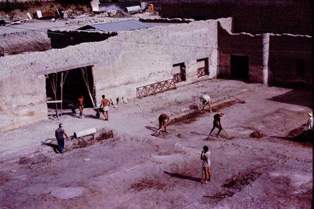 Oplontis, 1977. Looking south-east across east end of north garden. In this photo, the edge of the portico along the gardens east side is being seached for root-cavities.  Photo by Stanley A. Jashemski.   
Source: The Wilhelmina and Stanley A. Jashemski archive in the University of Maryland Library, Special Collections (See collection page) and made available under the Creative Commons Attribution-Non Commercial License v.4. See Licence and use details. J77f0232
