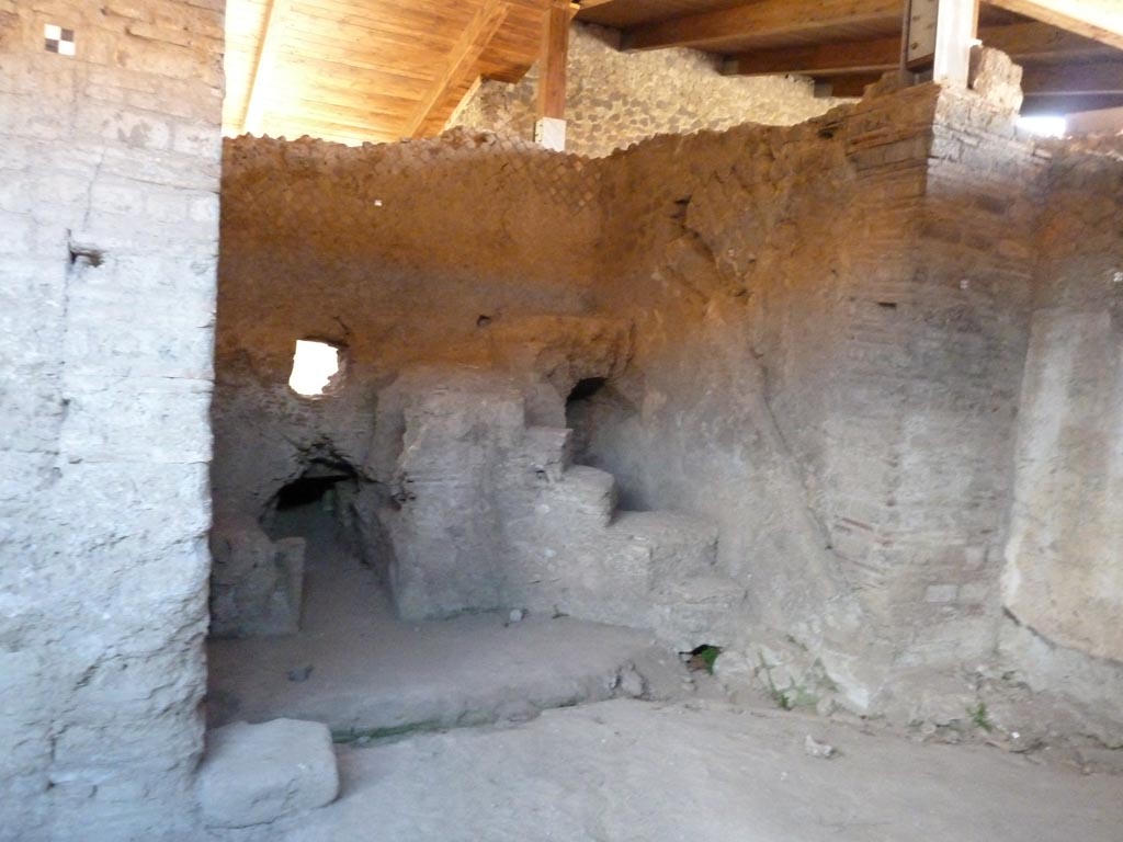 Stabiae, Villa Arianna, June 2019. Room 28, looking west across room giving access to room 29, praefurnium or boiler room.
Photo courtesy of Buzz Ferebee.
