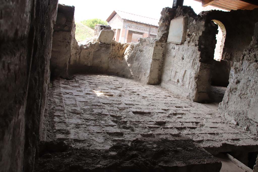 Stabiae, Villa Arianna, September 2021.  
Room 31, looking east across tepidarium, with doorway to room 6, on left. Photo courtesy of Klaus Heese.
