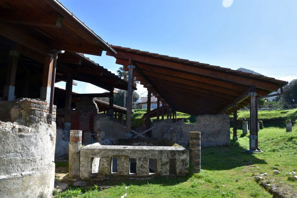 Stabiae, Villa Arianna, May 2018. Looking south across light-yard over ramp 76 with the pillars of area 73 on right.