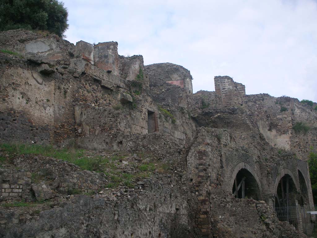 VIII.2.A, on left, with VIII.2.1, in centre, Pompeii. May 2010. Looking east from above lower level. Photo courtesy of Ivo van der Graaff.