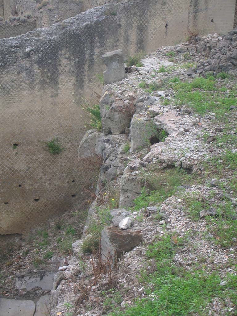 VIII.2.A Pompeii. May 2010. 
Looking west towards detail of walling at west end. Photo courtesy of Ivo van der Graaff.
