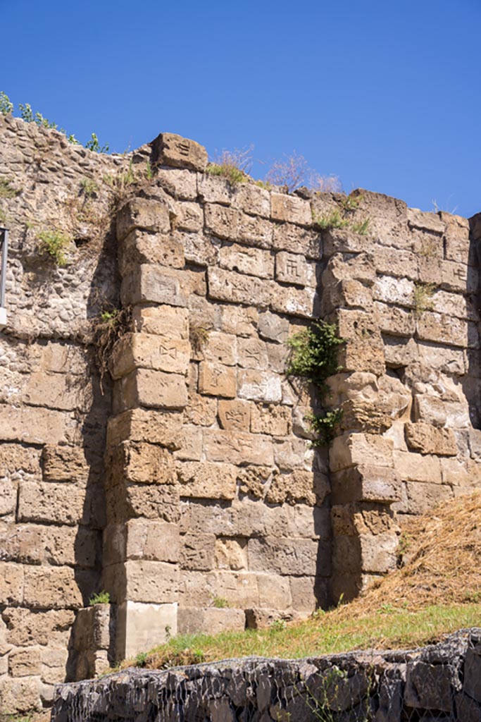 City Walls at end of Via di Mercurio, Pompeii. August 2023. 
Looking towards walls with Mason’s marks, on east side of Tower XI. Photo courtesy of Johannes Eber.
