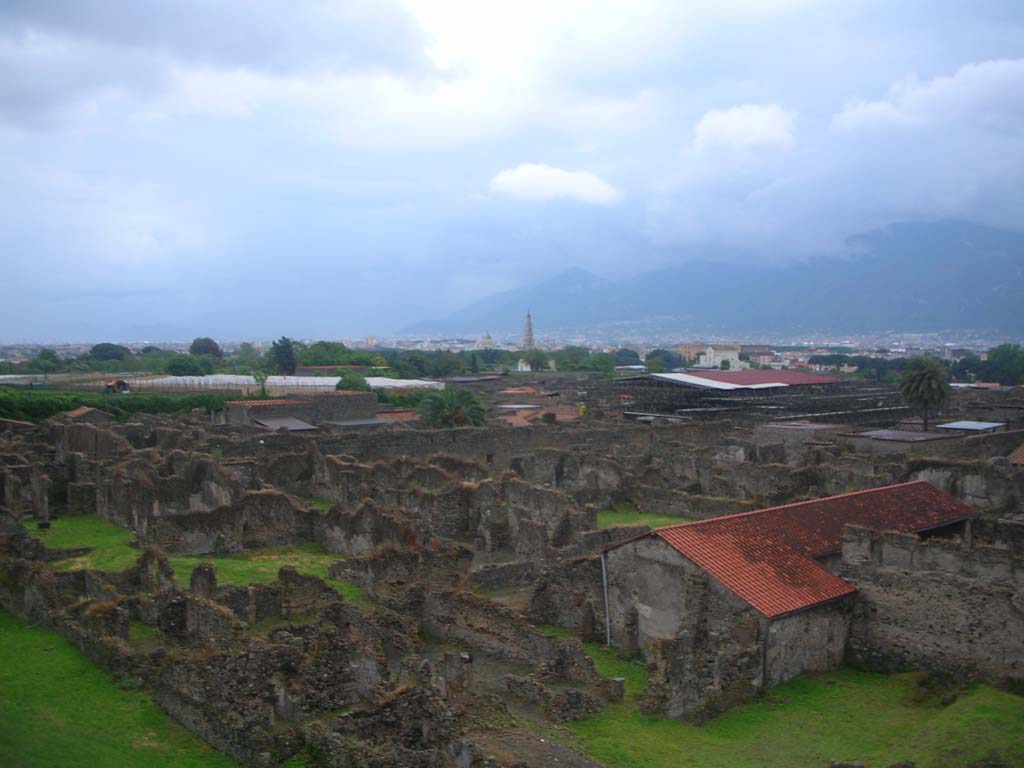 Tower XI, Pompeii. May 2010. Looking south-east from Tower across VI.9. Photo courtesy of Ivo van der Graaff.