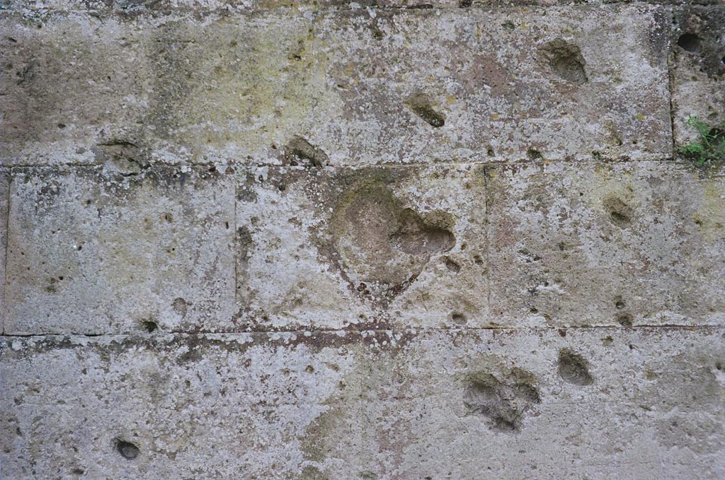 Walls at Pompeii Porta Ercolano or Herculaneum Gate. May 2010. East side with indentations in wall. Photo courtesy of Rick Bauer.