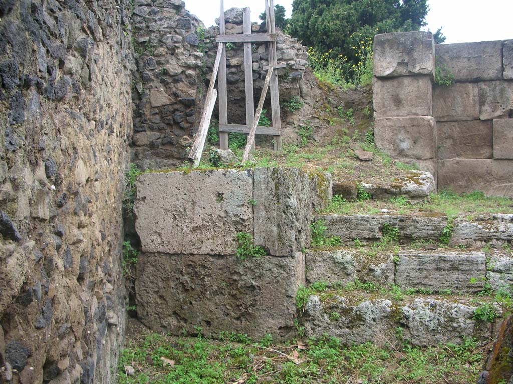 City Wall in north-west corner, next to Herculaneum Gate, Pompeii. May 2010. 
North-west corner behind steps in VI.1.1. Photo courtesy of Ivo van der Graaff.
