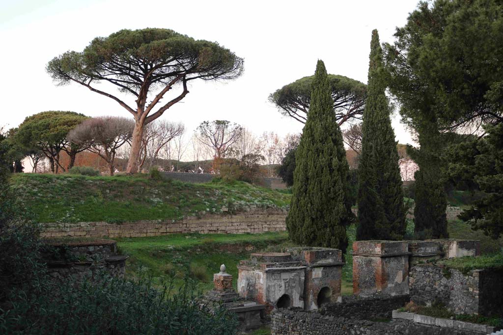 Walls on east side of Porta Nocera. December 2018. Looking north-east across Via del Tombe. Photo courtesy of Aude Durand.